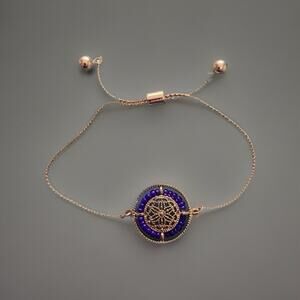 Gold tone beaded wheel adjustable bracelet